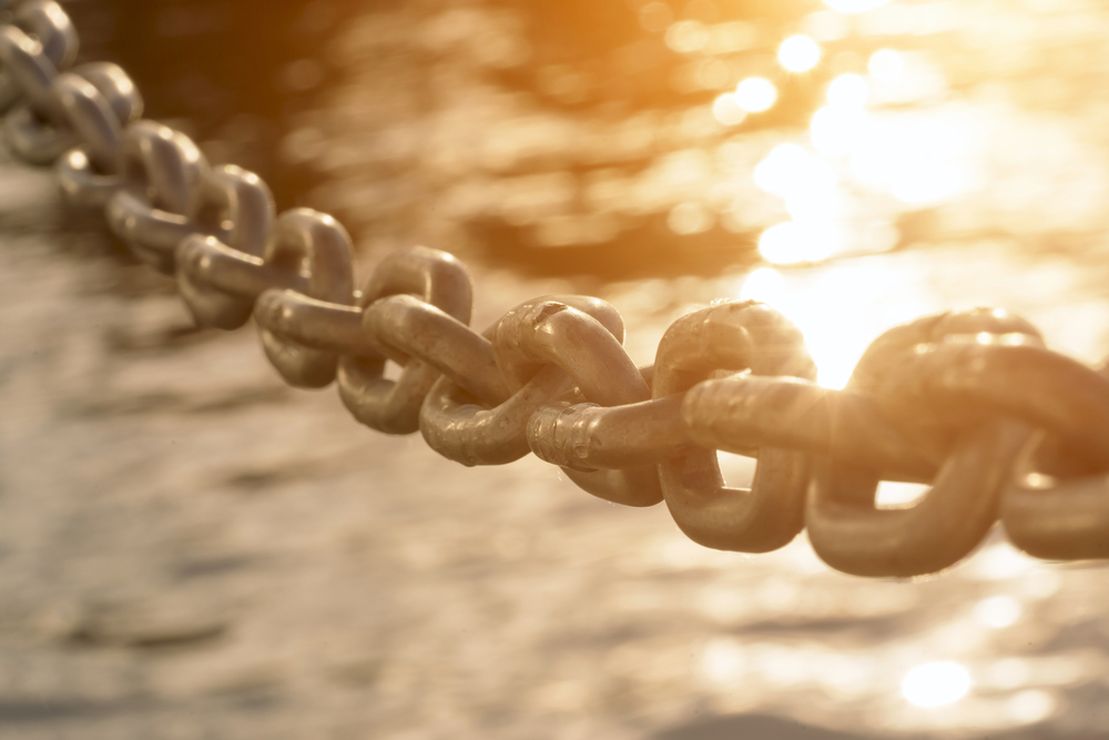 Metal chain on water