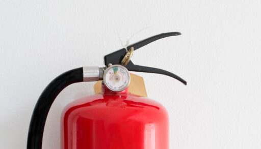 Close-up of fire extinguisher gauges.