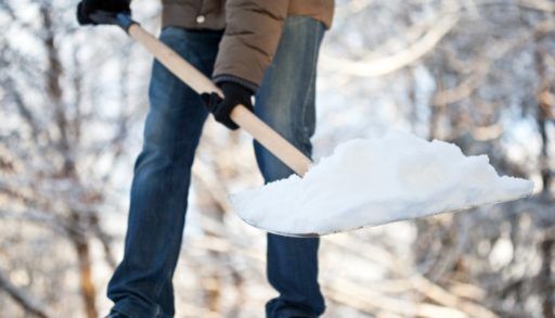 a person shovelling snow