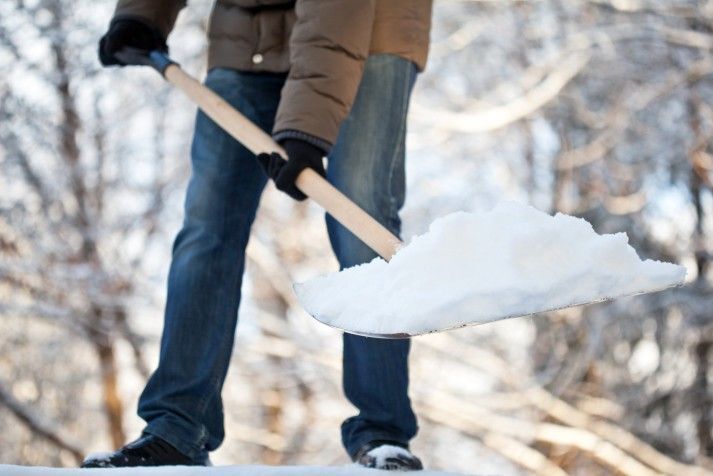 a person shovelling snow