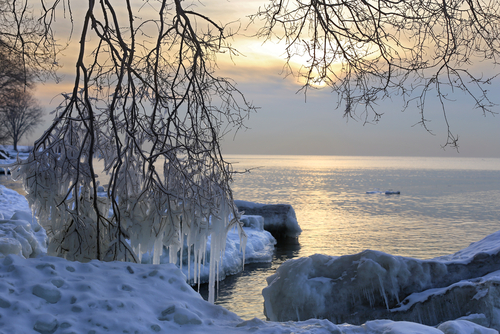 Snow-covered Lake Ontario at sunrise.
