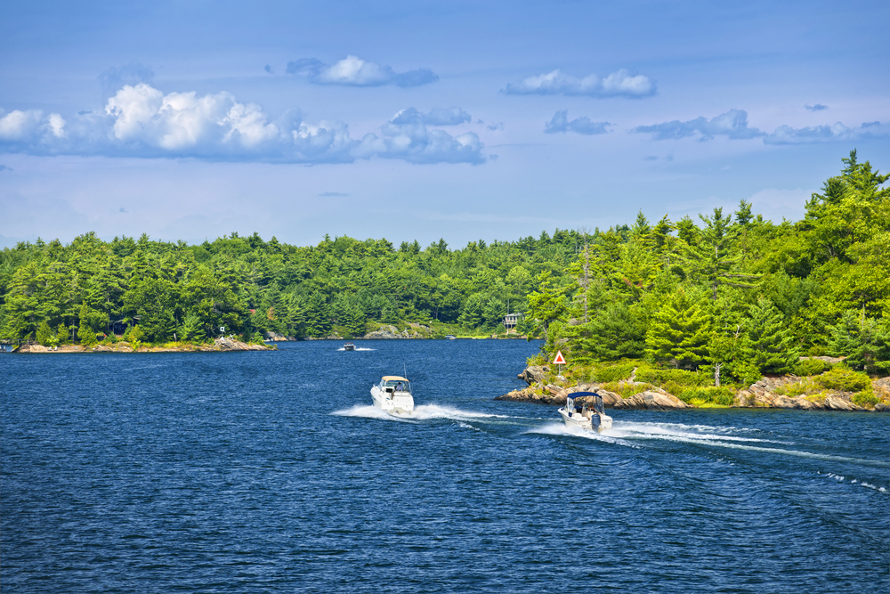 Recreational boats on blue waters of Georgian Bay near Parry Sound, Ontario Canada
