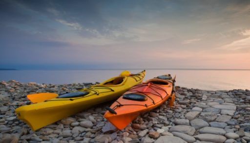 Kayaks on rocky shore