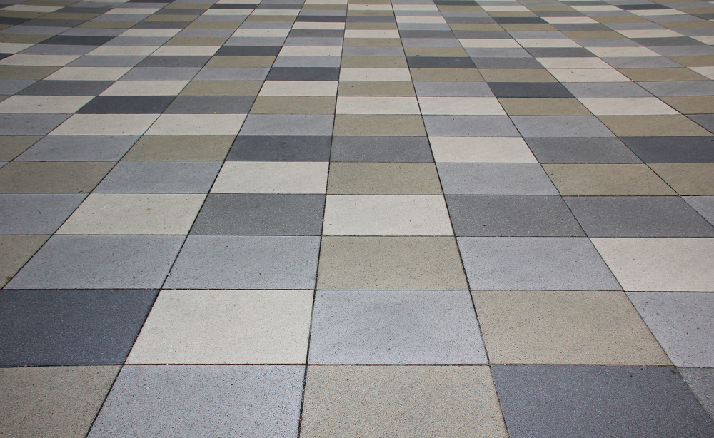 Different grey-coloured pavement tiles.