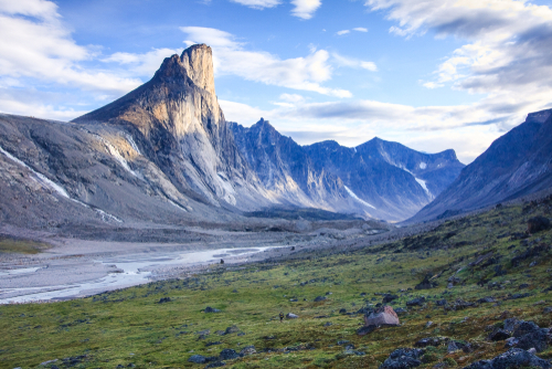 Mount Thor above a green valley in Auyuittuq National Park, Baffin Island, Nunavut.