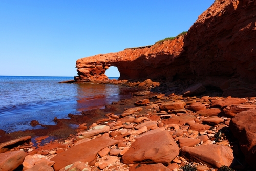 Red rocky beaches of Cavendish Beach, Prince Edward Island, Canada.