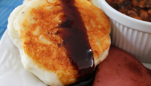 Touton (fried bread) covered in molasses.