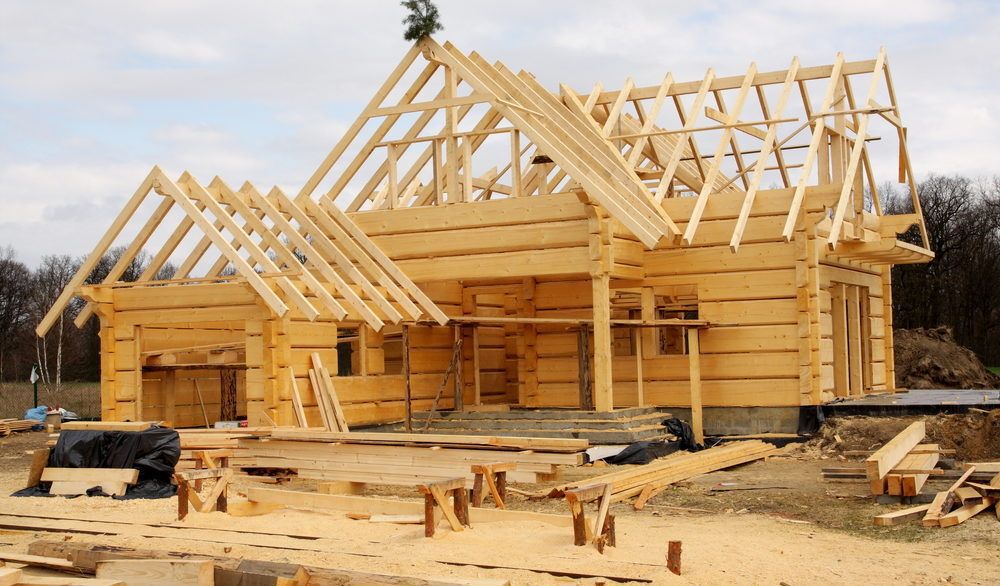 Wooden frame of a cabin under construction.