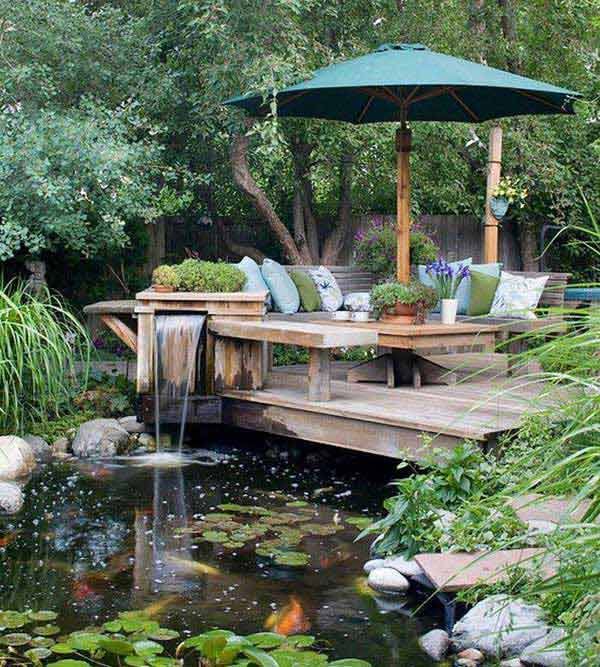 Outdoor living area with fish pond.