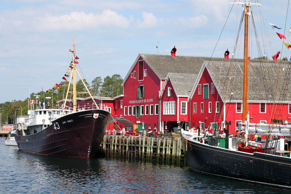 Red buildings along the Lunenberg harbour in Nova Scotia.