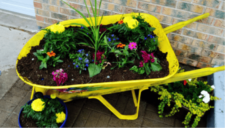 Repurposed Wheelbarrow Handle Rack 7 cool ways to repurpose your rusty old wheelbarrow - Cottage Life