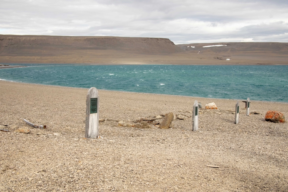 Headstones of Franklin Expedition members next to the ocean on Beechy Island, Nunavut.