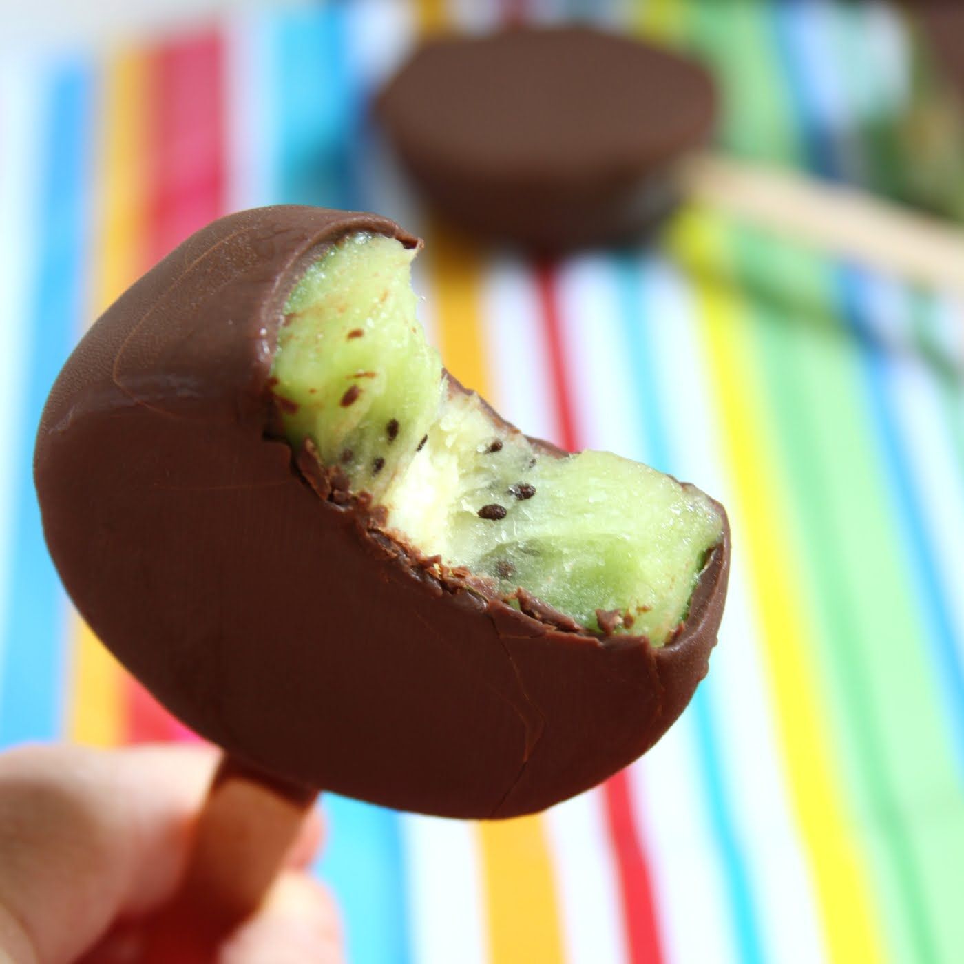 Chocolate-covered kiwi pops