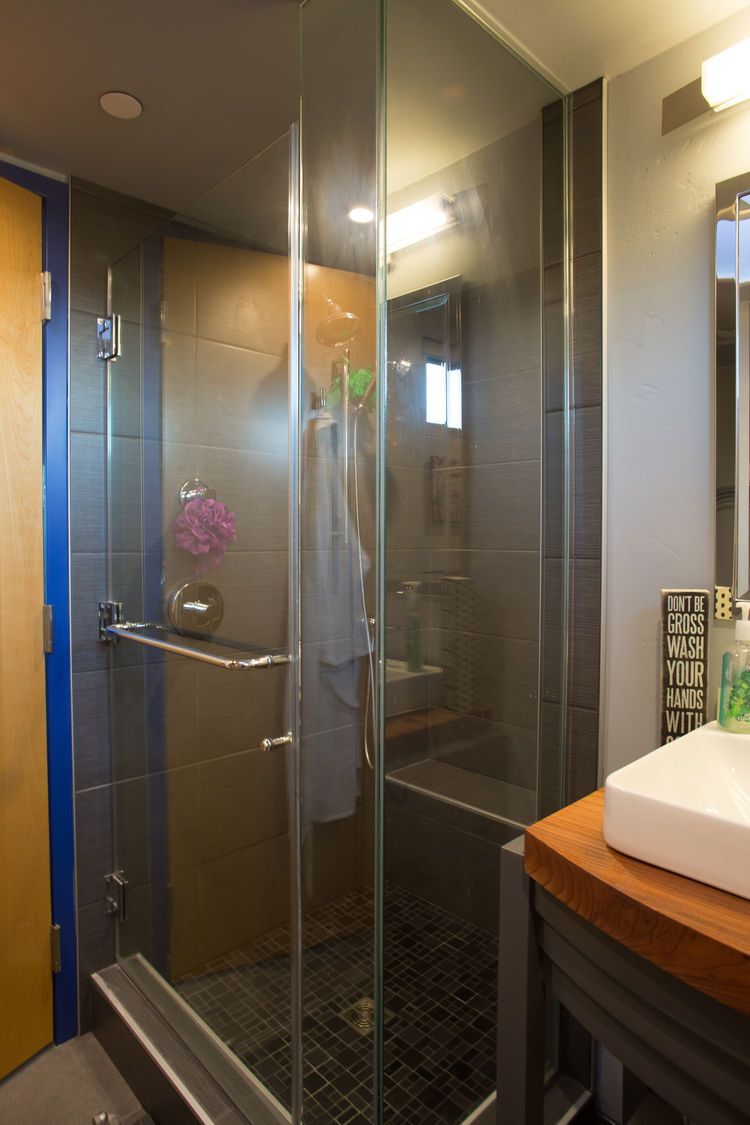 A detailed view of the shower inside the cabin.