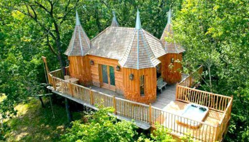 An exterior view of a castle tree house.