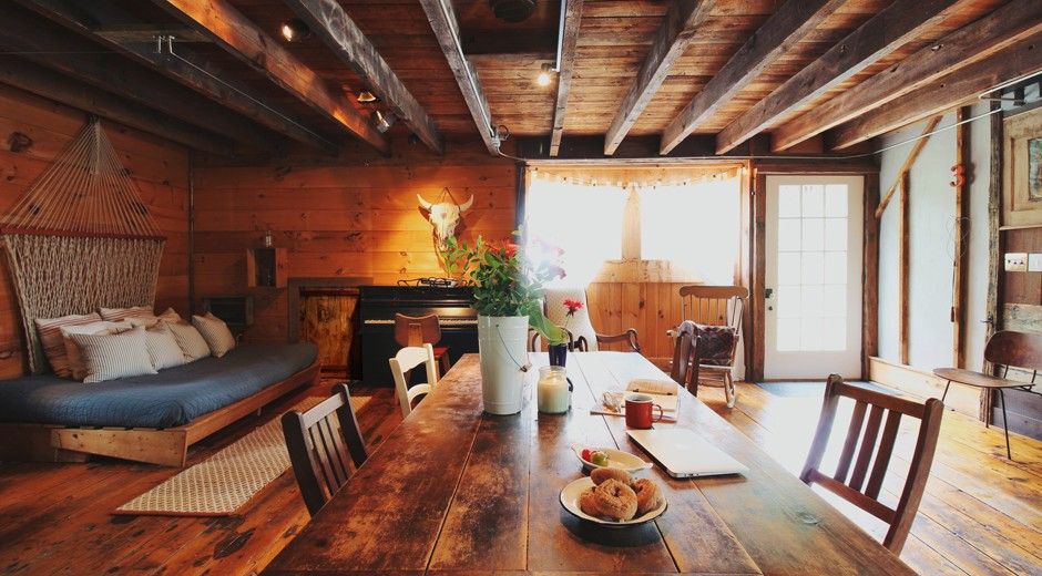The living room and dining room of the restored barn.