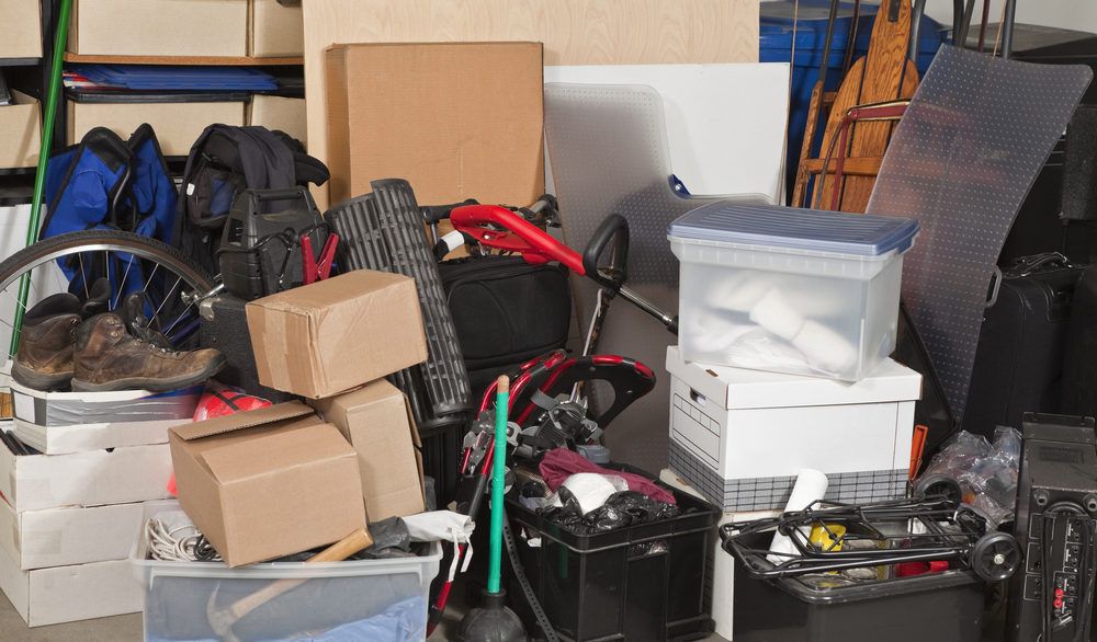 Boxes of junk in a garage.