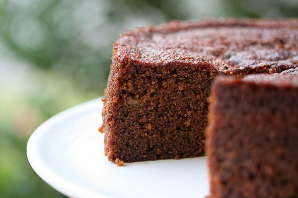 A ginger cake with a slice removed