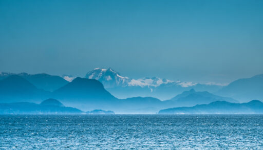 View of the Coast Mountains in B.C. across the Georgia Strait from Vancouver Island.