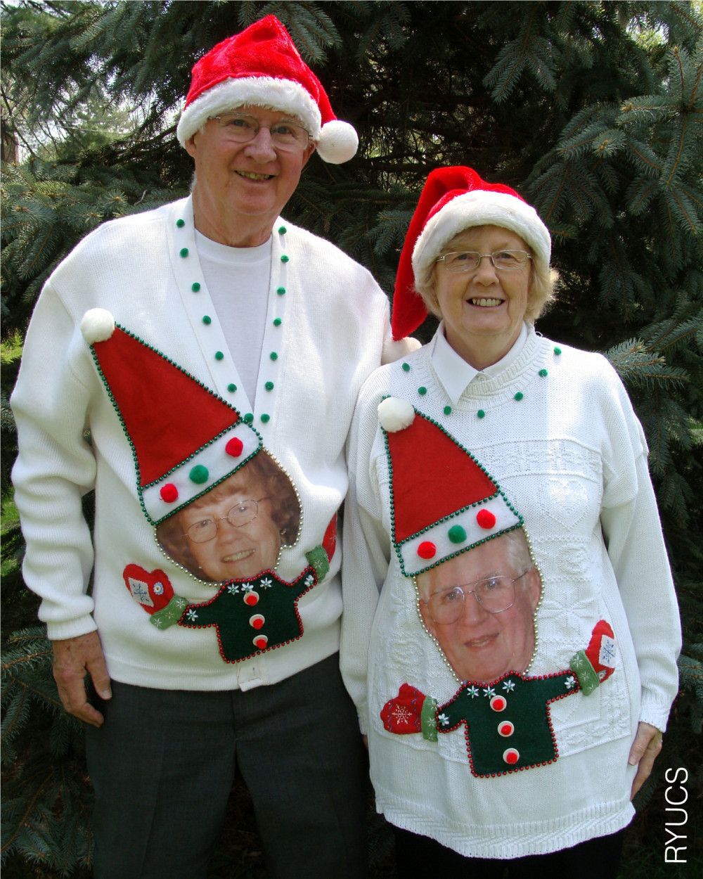 An older couple in matching sweaters portraying each other as elves