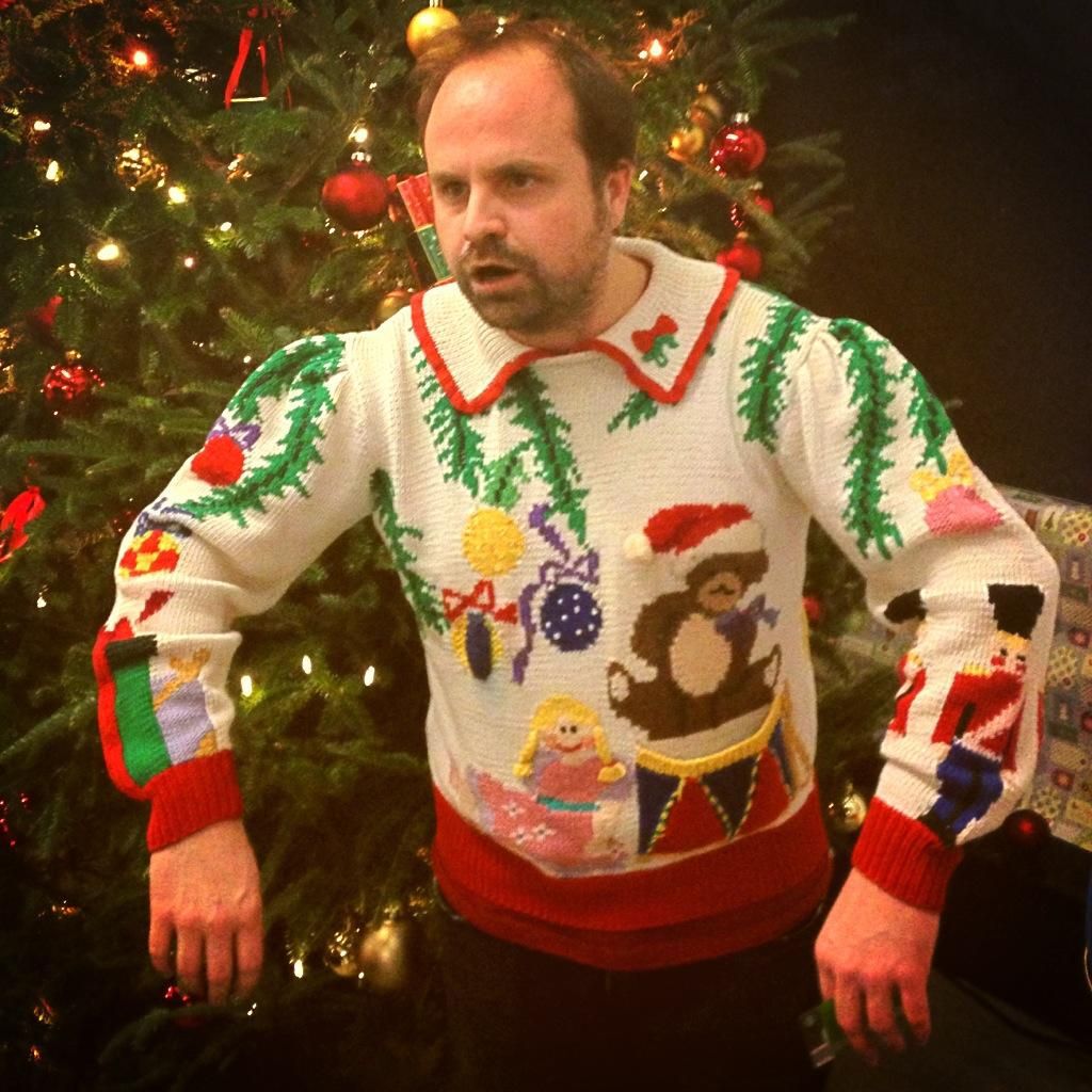 Man in ugly collared sweater