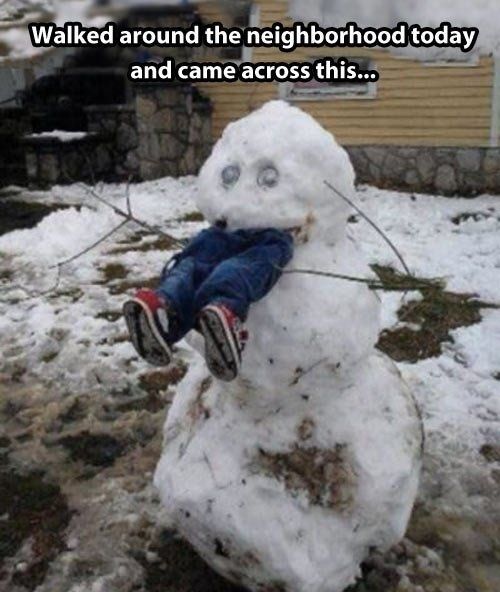 Snowman with kids legs protruding from the mouth