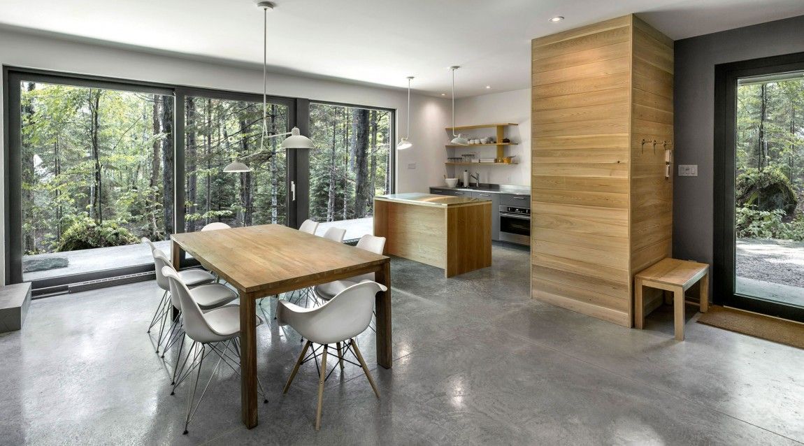 Table and chairs next to kitchen