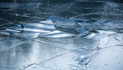 Close-up of broken ice on water.