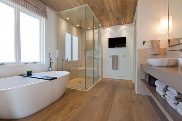 bathroom with tub and shower