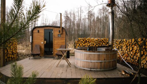 Wooden outdoor sauna in a forest.