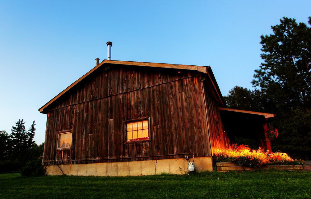 An old house with wooden siding.