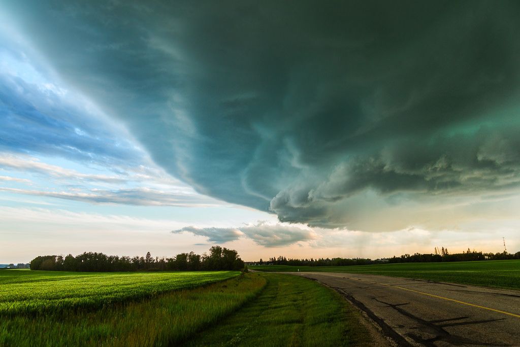 Dark clouds over a blue sky
