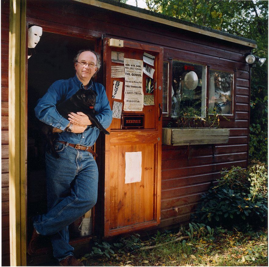 Philip Pullman outside his shed