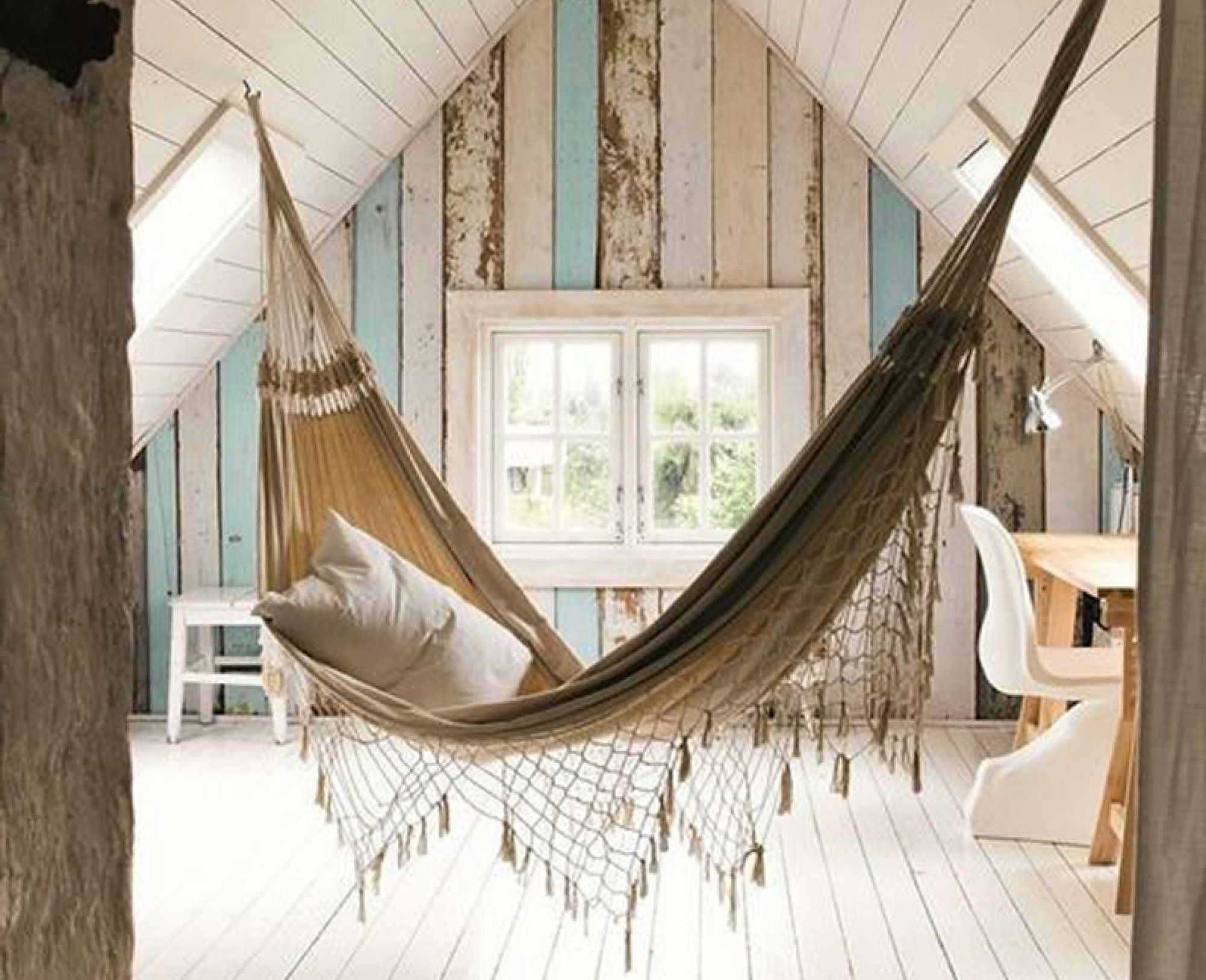 A hammock in an empty attic