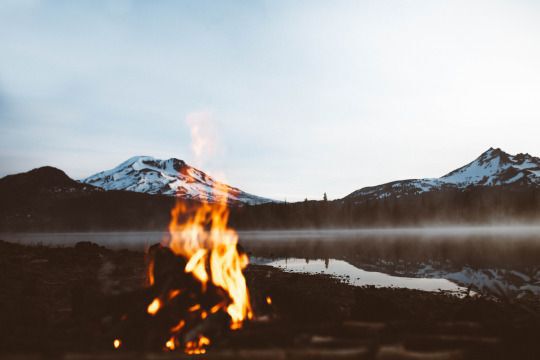 Fire in front of mountain view