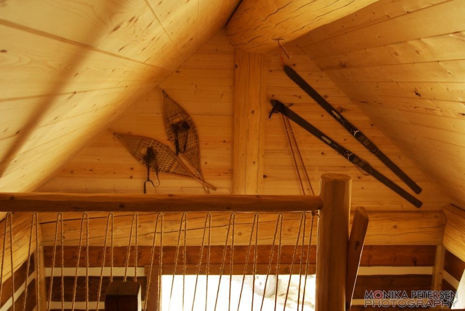 wall with snowshoes and skis
