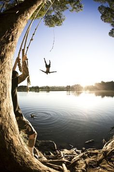 Man diving backwards into water