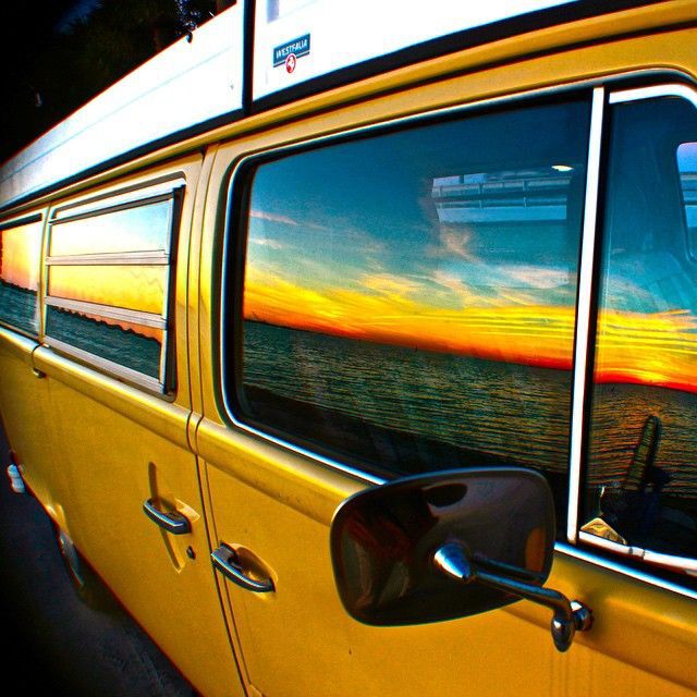 beach reflected in van window