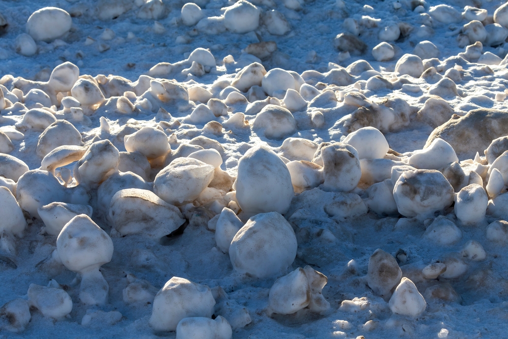 Giant and irregular ice balls on the shores of Lake Michigan.