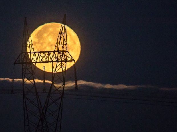 Supermoon above clouds