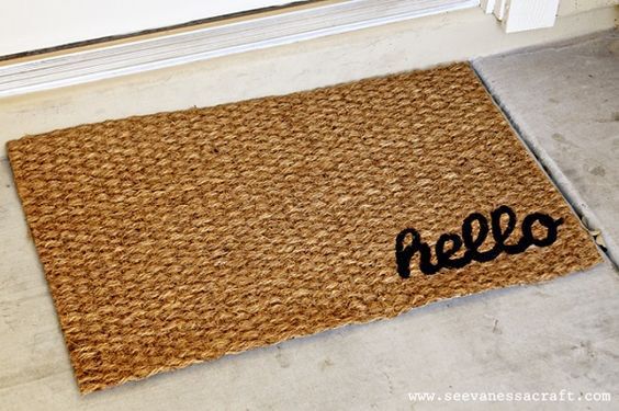 Welcome mat reading "hello"