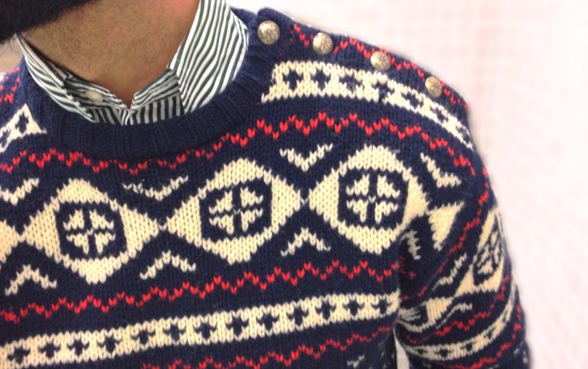 Man's torso in sweater