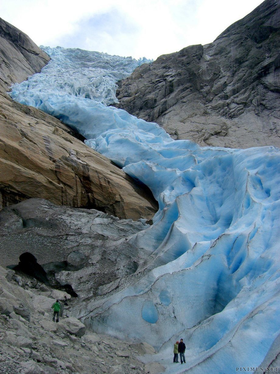 Glacier flowing down rock