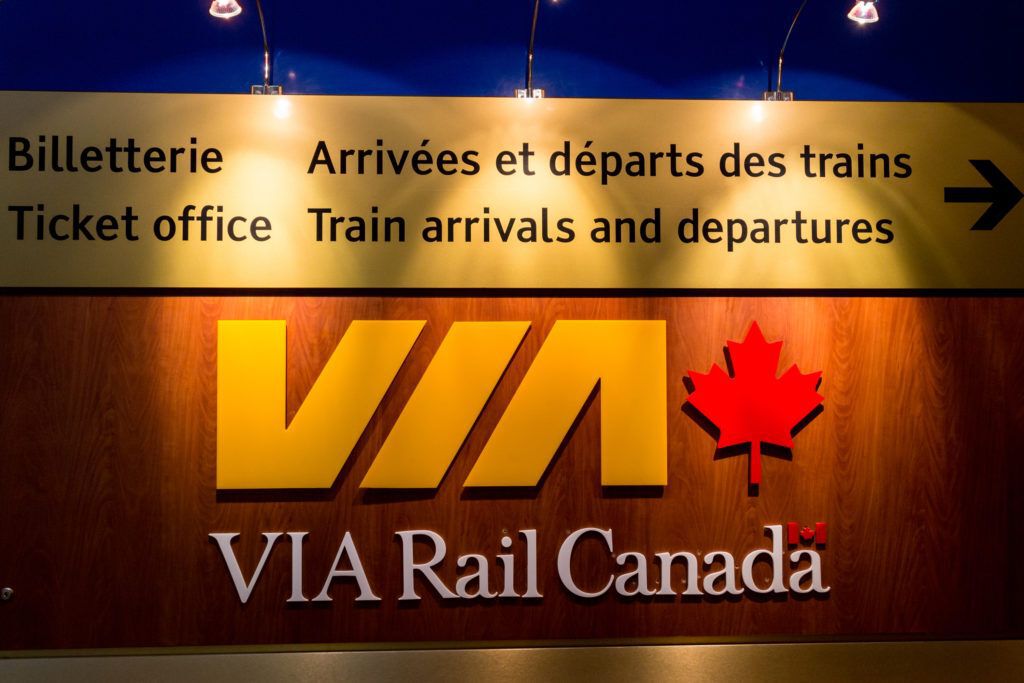 Via Rail departures board lit up in Quebec City, Canada.