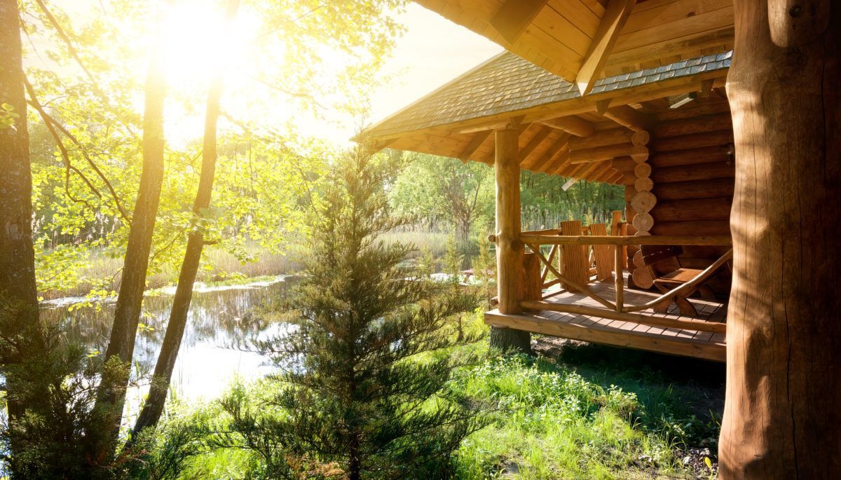 wooden cabin during sunrise