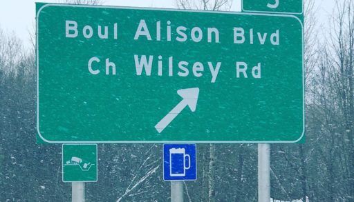 Road sign with a blue beer symbol