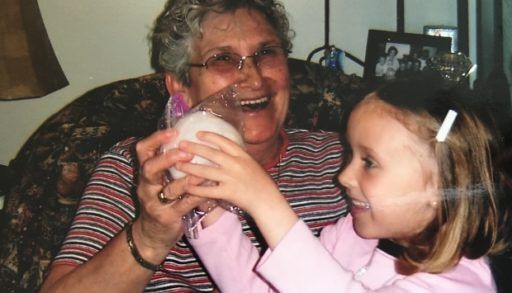 Child's hand holding a snowball