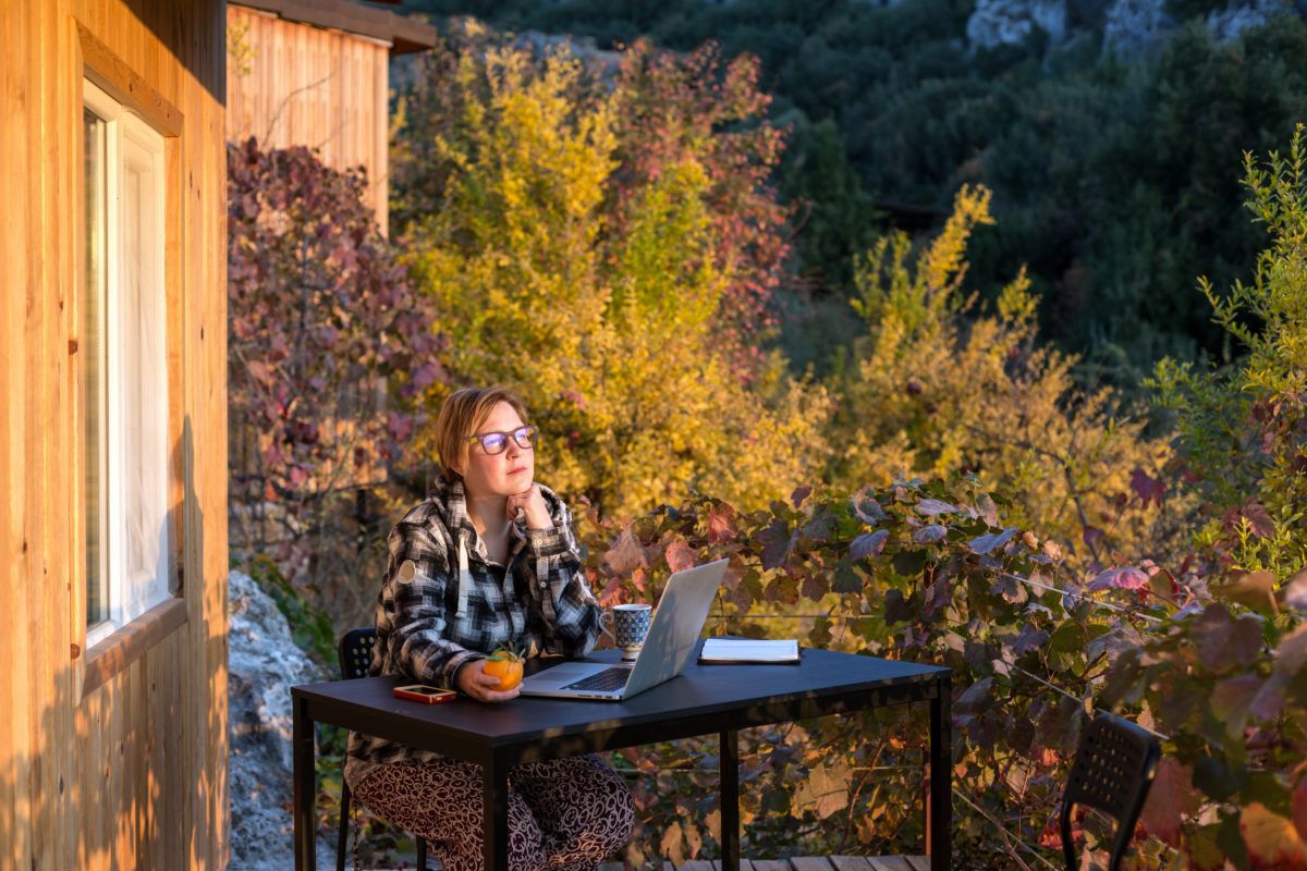 Woman working from the cottage