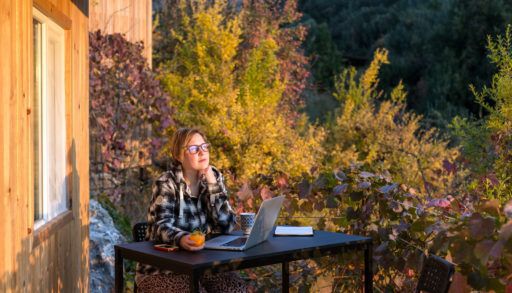 Woman working from the cottage
