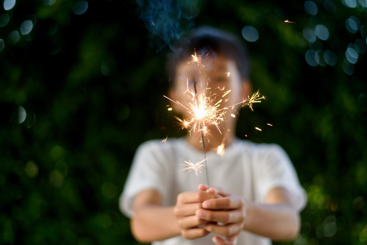 Boy-holding-a-sparkler